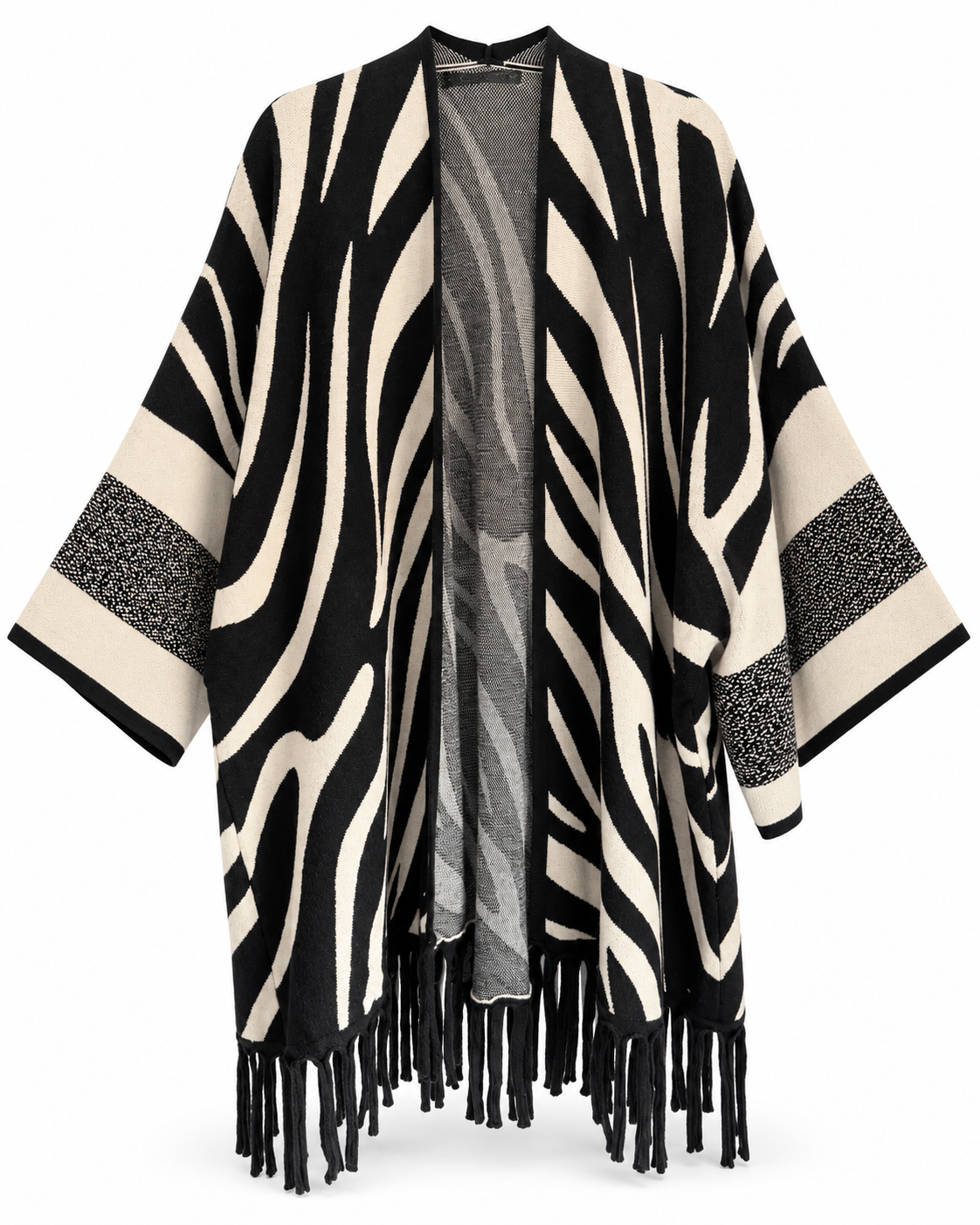 Poncho zebrato con frange