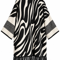 Poncho zebrato con frange